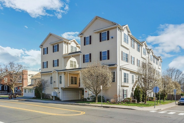 205 Hope St Unit 5, Stamford, CT 06906 - view of property with a garage and a residential view