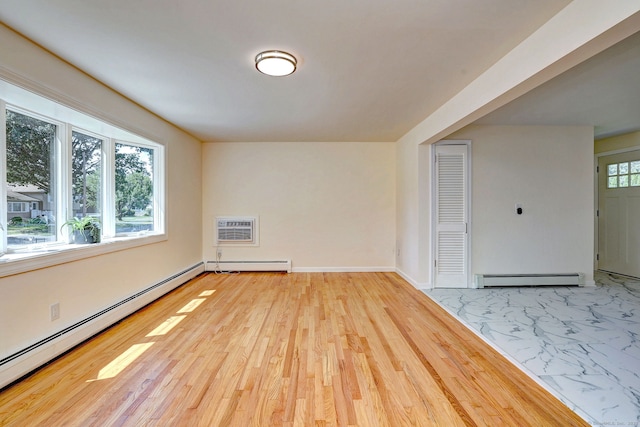 6 Overbrook Dr, East Hartford, CT 06118 - spare room with a baseboard radiator and wood finished floors