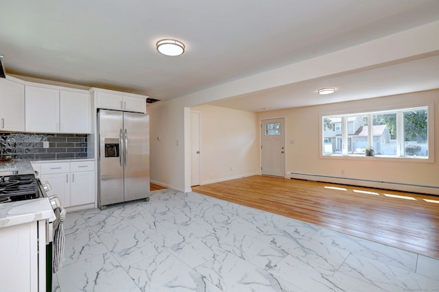 6 Overbrook Dr, East Hartford, CT 06118 - kitchen featuring stainless steel fridge with ice dispenser, gas range oven, light marble finish floors, and tasteful backsplash