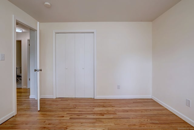6 Overbrook Dr, East Hartford, CT 06118 - unfurnished bedroom with light wood-type flooring and a closet
