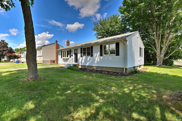 6 Overbrook Dr, East Hartford, CT 06118 - view of front of house with a front lawn and a chimney