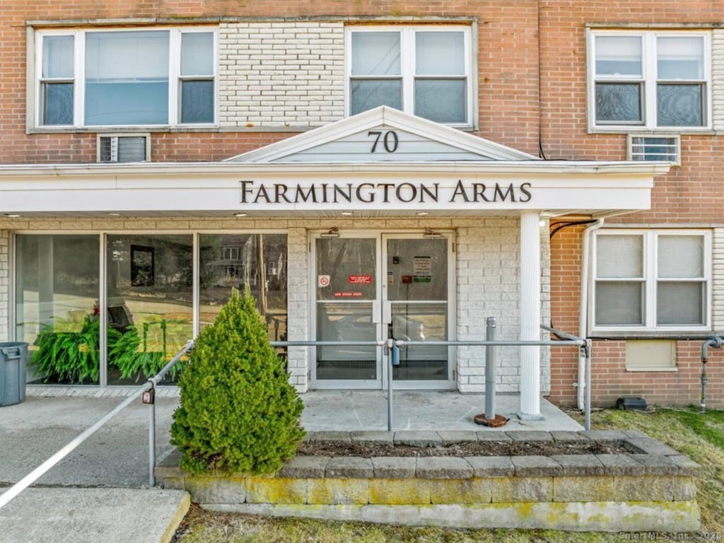70 Farmington Ave Unit 1V, New London, CT 06320 - doorway to property featuring brick siding