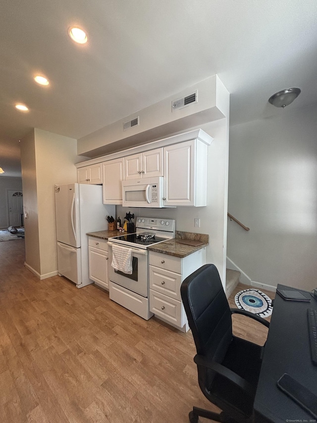 22 Wishing Well Ln Unit 22, New Milford, CT 06776 - kitchen featuring white appliances, white cabinetry, light wood finished floors, recessed lighting, and dark stone countertops