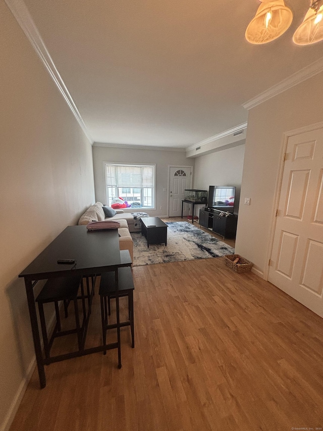 22 Wishing Well Ln Unit 22, New Milford, CT 06776 - living area featuring crown molding and wood finished floors