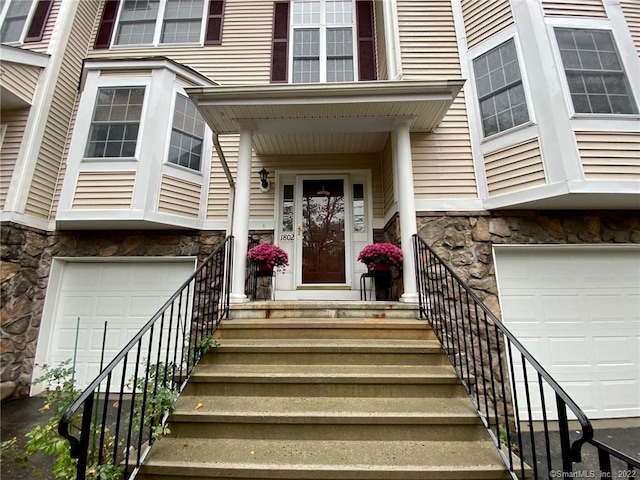 1802 Larson Dr Unit 1802, Danbury, CT 06810 - entrance to property featuring a garage and stone siding