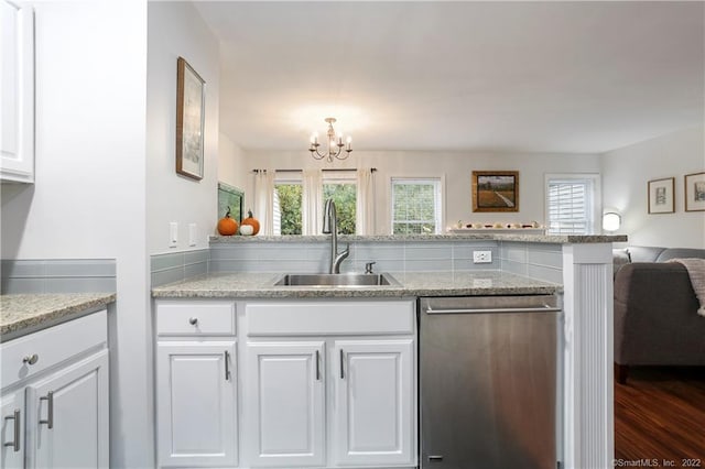 1802 Larson Dr Unit 1802, Danbury, CT 06810 - kitchen with dishwasher, a chandelier, white cabinets, open floor plan, and light stone countertops