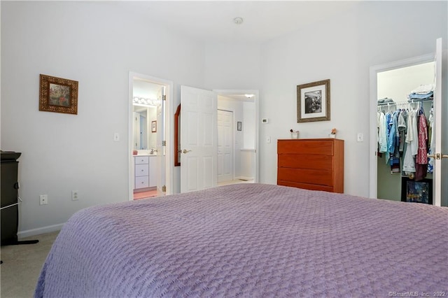 1802 Larson Dr Unit 1802, Danbury, CT 06810 - carpeted bedroom with a walk in closet, a closet, and ensuite bathroom