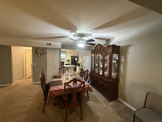 711 Twin Circle Dr Unit 711, South Windsor, CT 06074 - carpeted dining space featuring a textured ceiling and ceiling fan