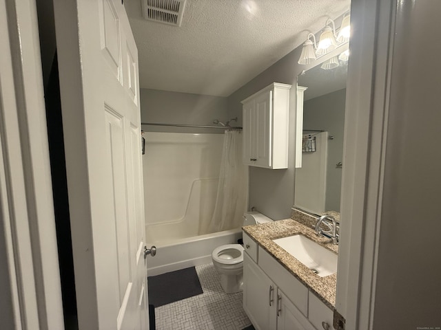 711 Twin Circle Dr Unit 711, South Windsor, CT 06074 - full bath with tile patterned floors, vanity, shower / tub combo, and a textured ceiling