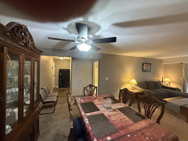 711 Twin Circle Dr Unit 711, South Windsor, CT 06074 - carpeted dining area with a textured ceiling and a ceiling fan