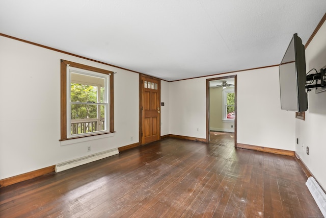 159 Bolton Rd, Vernon, CT 06066 - unfurnished living room with a baseboard heating unit, plenty of natural light, crown molding, wood-type flooring, and ceiling fan