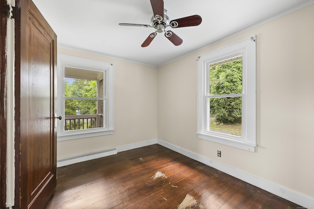 159 Bolton Rd, Vernon, CT 06066 - empty room with a baseboard heating unit, plenty of natural light, dark wood finished floors, and crown molding