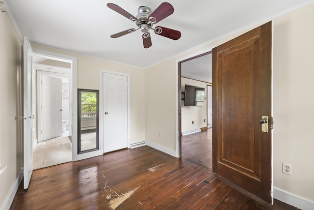 159 Bolton Rd, Vernon, CT 06066 - unfurnished bedroom with ornamental molding, dark wood-style floors, and ceiling fan