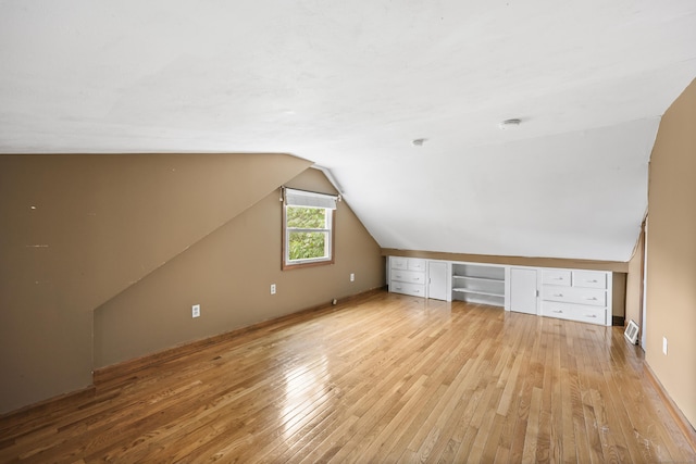 159 Bolton Rd, Vernon, CT 06066 - additional living space featuring light wood-style floors, vaulted ceiling, and a desk