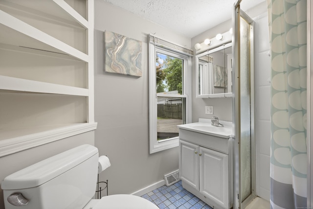 159 Bolton Rd, Vernon, CT 06066 - bathroom with a shower stall, vanity, a textured ceiling, and tile patterned flooring