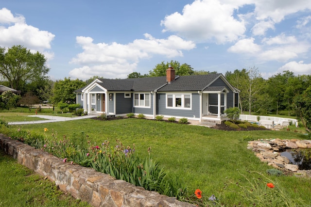 35 Emmons Ln, North Canaan, CT 06018 - ranch-style house with a chimney and a front lawn
