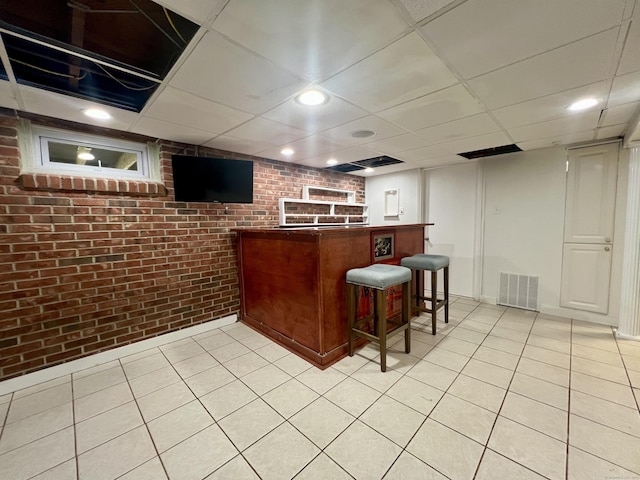 65 Patchen St, Stratford, CT 06615 - indoor dry bar with brick wall, recessed lighting, a drop ceiling, and light tile patterned flooring