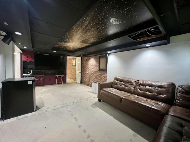65 Patchen St, Stratford, CT 06615 - cinema with concrete floors and brick wall