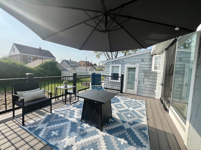 65 Patchen St, Stratford, CT 06615 - deck featuring an outdoor living space with a fire pit and a residential view