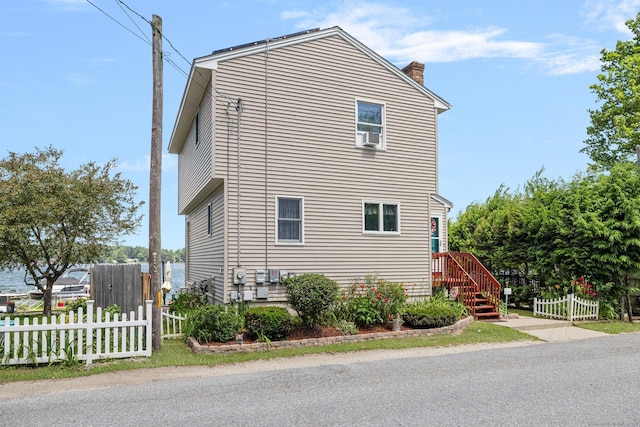 138 S Shore Rd, Killingly, CT 06241 - view of side of home with a chimney