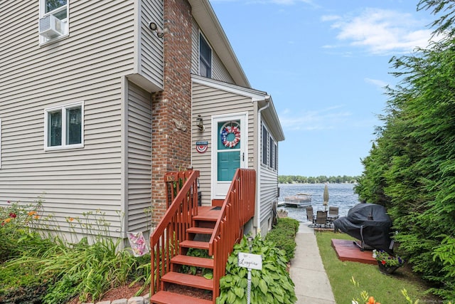 138 S Shore Rd, Killingly, CT 06241 - doorway to property featuring a water view and cooling unit