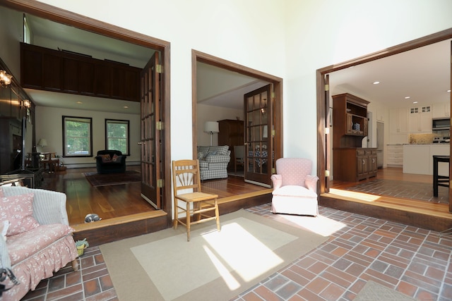 9 River Bend Ln, Windsor, CT 06095 - living room featuring brick patterned flooring and recessed lighting