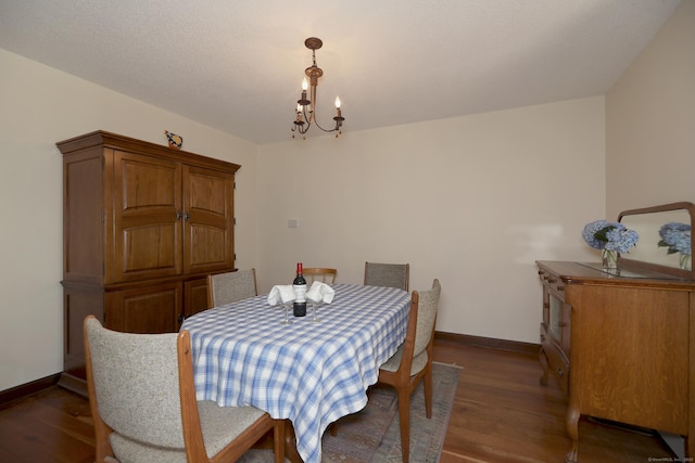 9 River Bend Ln, Windsor, CT 06095 - dining room featuring a chandelier and wood finished floors