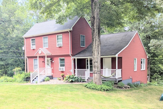 19 Wendell Rd, Ellington, CT 06029 - colonial house with a front lawn, roof with shingles, and covered porch