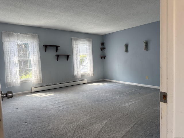 16 Snow Rdg S, Middletown, CT 06457 - carpeted spare room with baseboard heating and a textured ceiling