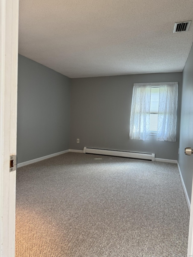 16 Snow Rdg S, Middletown, CT 06457 - carpeted spare room with a baseboard radiator and a textured ceiling