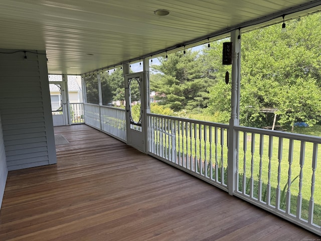 16 Snow Rdg S, Middletown, CT 06457 - wooden deck with a lawn and a sunroom