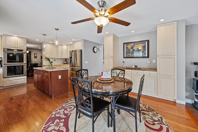 21 Derek Ln, Windsor, CT 06095 - dining room featuring ceiling fan, wood finished floors, and recessed lighting