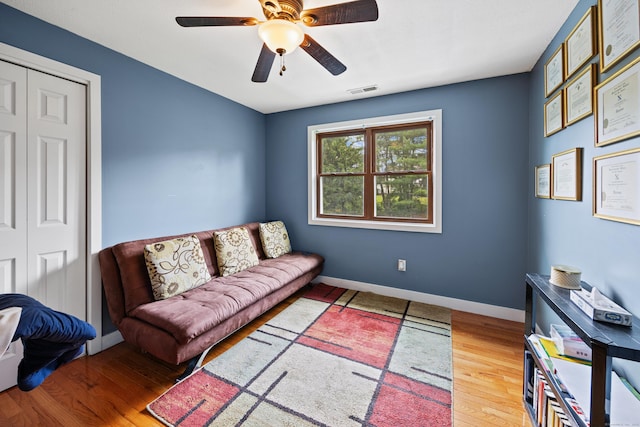 21 Derek Ln, Windsor, CT 06095 - sitting room with wood finished floors and ceiling fan