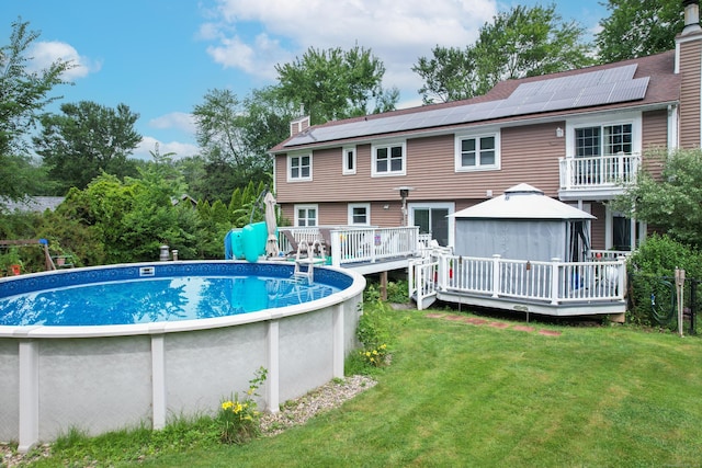 21 Derek Ln, Windsor, CT 06095 - swimming pool with a gazebo, a deck, and a lawn