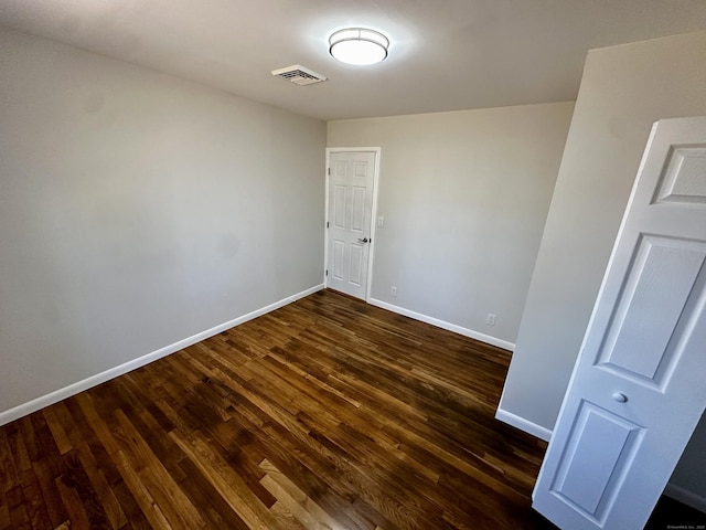 26 Riverdale Rd, Milford, CT 06460 - spare room with dark wood-style floors and baseboards
