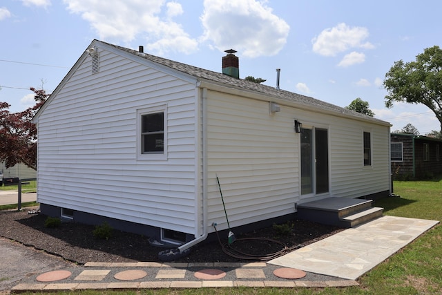 26 Riverdale Rd, Milford, CT 06460 - view of side of property with a chimney