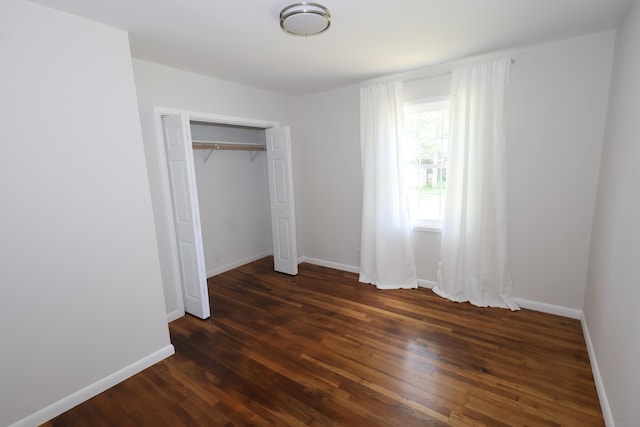 26 Riverdale Rd, Milford, CT 06460 - unfurnished bedroom featuring dark wood-style floors and a closet