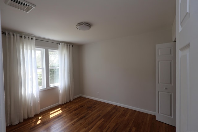 26 Riverdale Rd, Milford, CT 06460 - unfurnished room with dark wood-style flooring