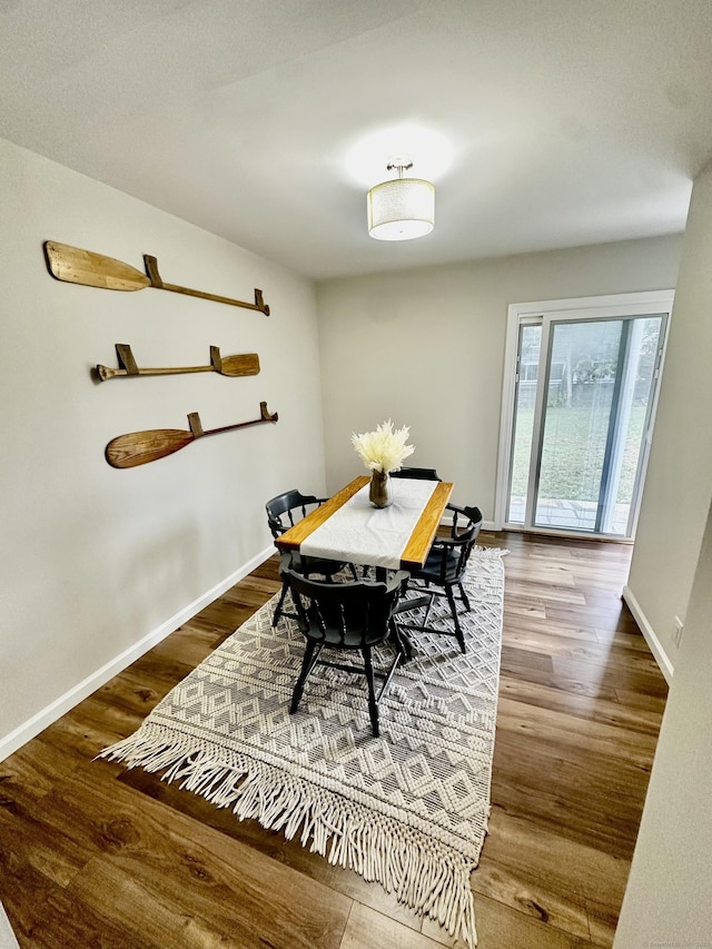 26 Riverdale Rd, Milford, CT 06460 - dining area with wood finished floors and baseboards