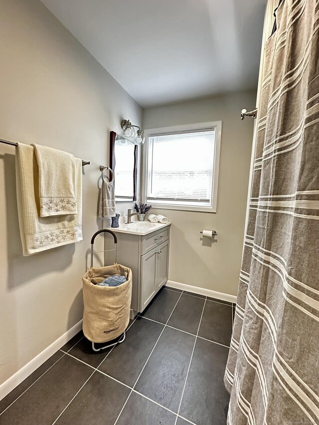 26 Riverdale Rd, Milford, CT 06460 - full bath with tile patterned floors, vanity, and a shower with curtain