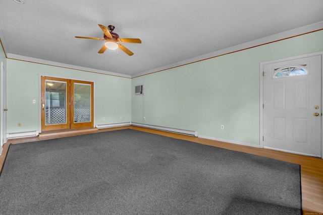108 Sandelwood Dr, Madison, CT 06443 - spare room with a ceiling fan, a baseboard heating unit, wood finished floors, and crown molding