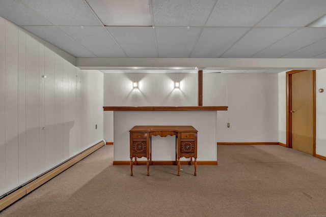 108 Sandelwood Dr, Madison, CT 06443 - below grade area with a baseboard heating unit, carpet floors, and a drop ceiling