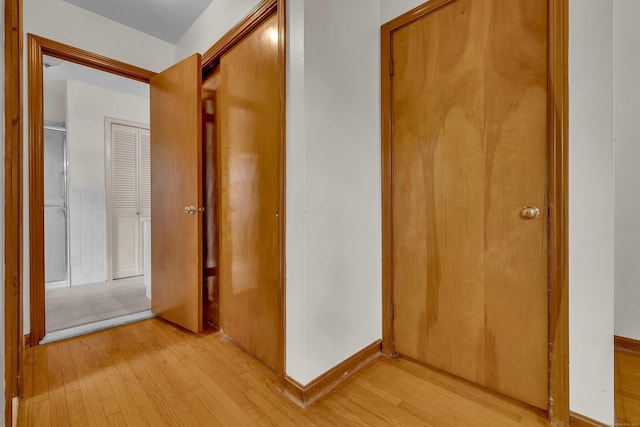 108 Sandelwood Dr, Madison, CT 06443 - hall with light wood-style flooring and baseboards