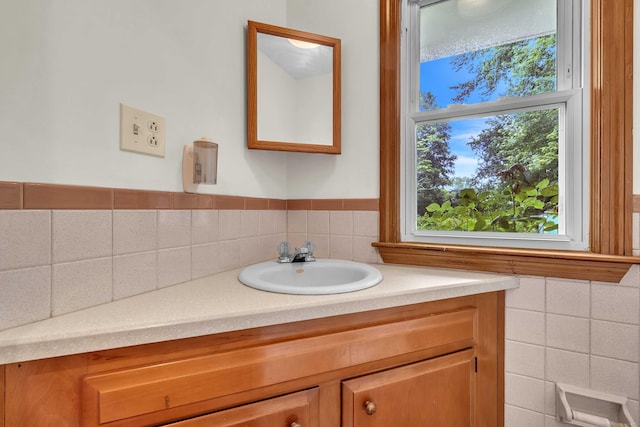 108 Sandelwood Dr, Madison, CT 06443 - bathroom with vanity, plenty of natural light, and tile walls