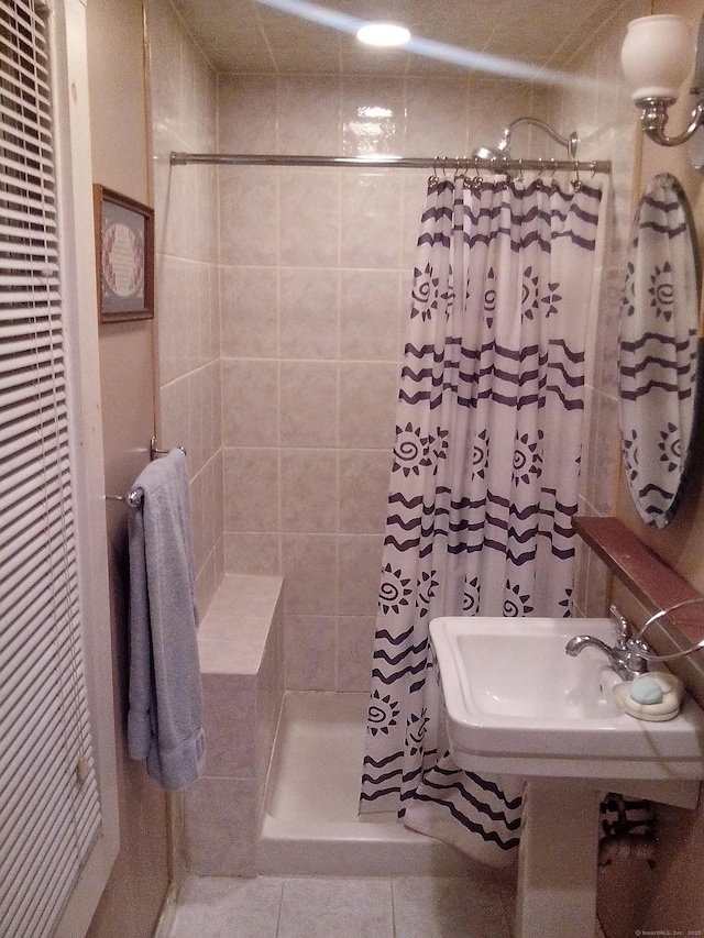 134 Greenwich Ave, New Haven, CT 06519 - full bath with a heating unit, a tile shower, and tile patterned floors