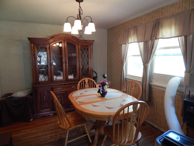 85 Bradford Rd, Torrington, CT 06790 - dining area featuring dark wood-style flooring, a chandelier, and wallpapered walls