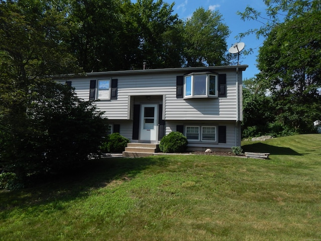85 Bradford Rd, Torrington, CT 06790 - raised ranch featuring a front lawn
