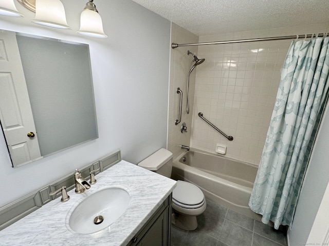 68 Wilson Ave Apt 103, Torrington, CT 06790 - bathroom with shower / bath combo with shower curtain, vanity, tile patterned floors, and a textured ceiling