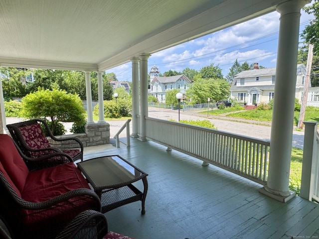 68 Wilson Ave Apt 103, Torrington, CT 06790 - sunroom featuring a residential view and healthy amount of natural light