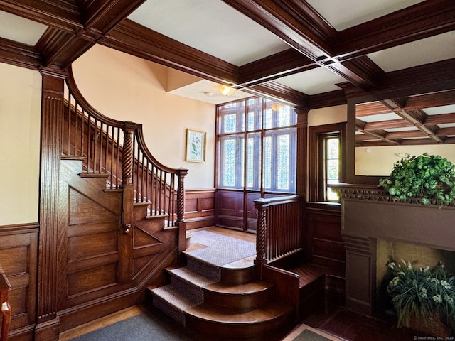 68 Wilson Ave Apt 103, Torrington, CT 06790 - stairway with coffered ceiling, beamed ceiling, a wainscoted wall, crown molding, and wood finished floors